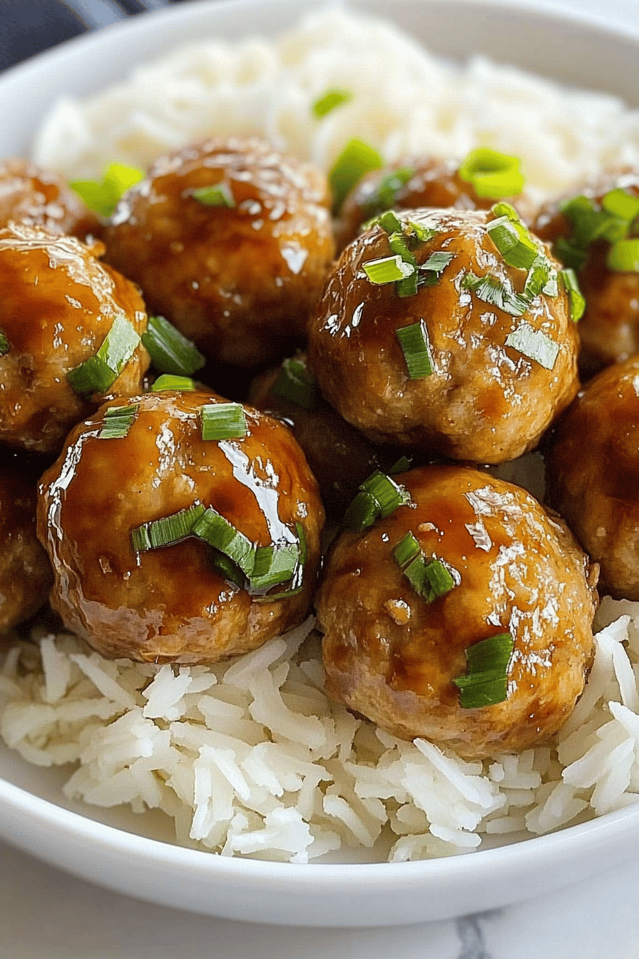 Pineapple Teriyaki Chicken Meatballs slice on plate showing perfect texture and swirl pattern